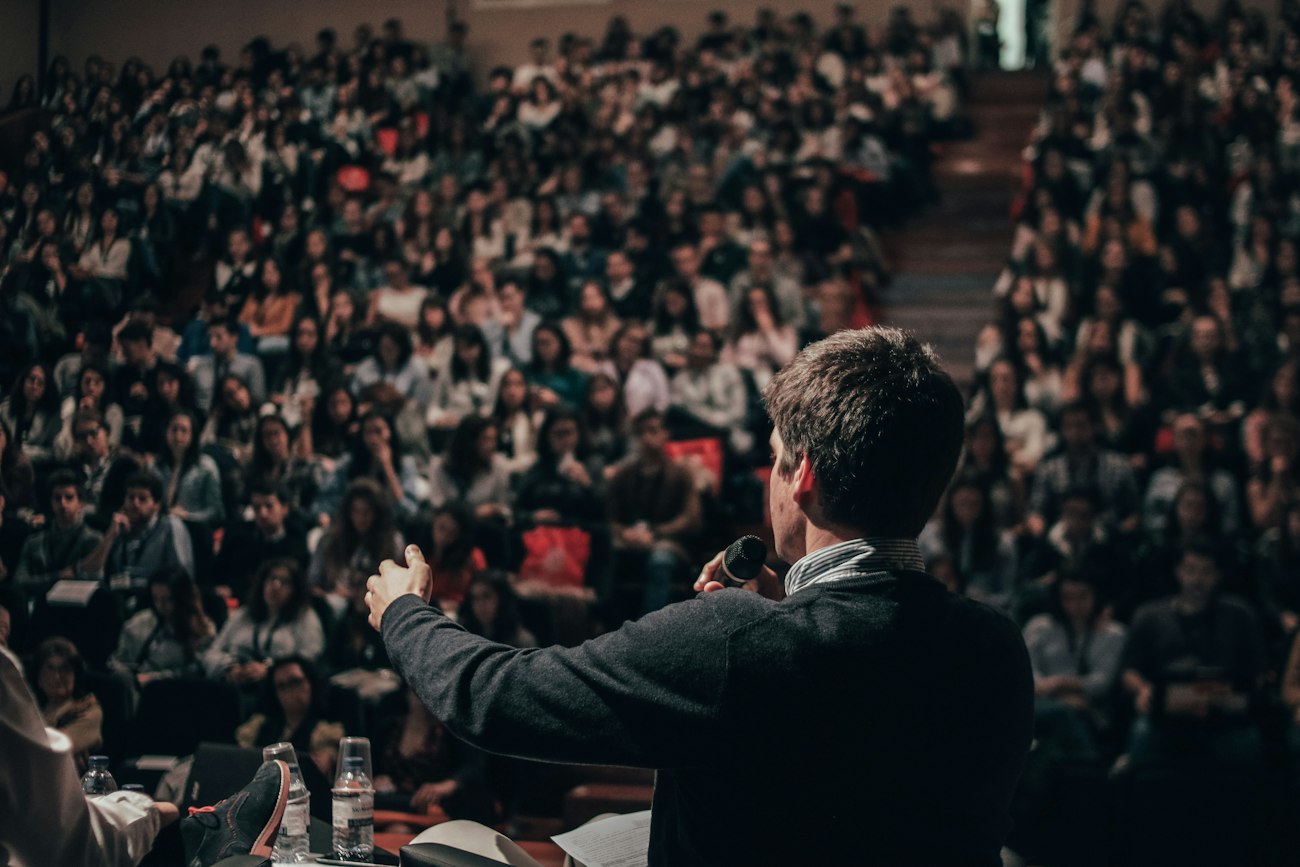 Speaker addressing a conference audience