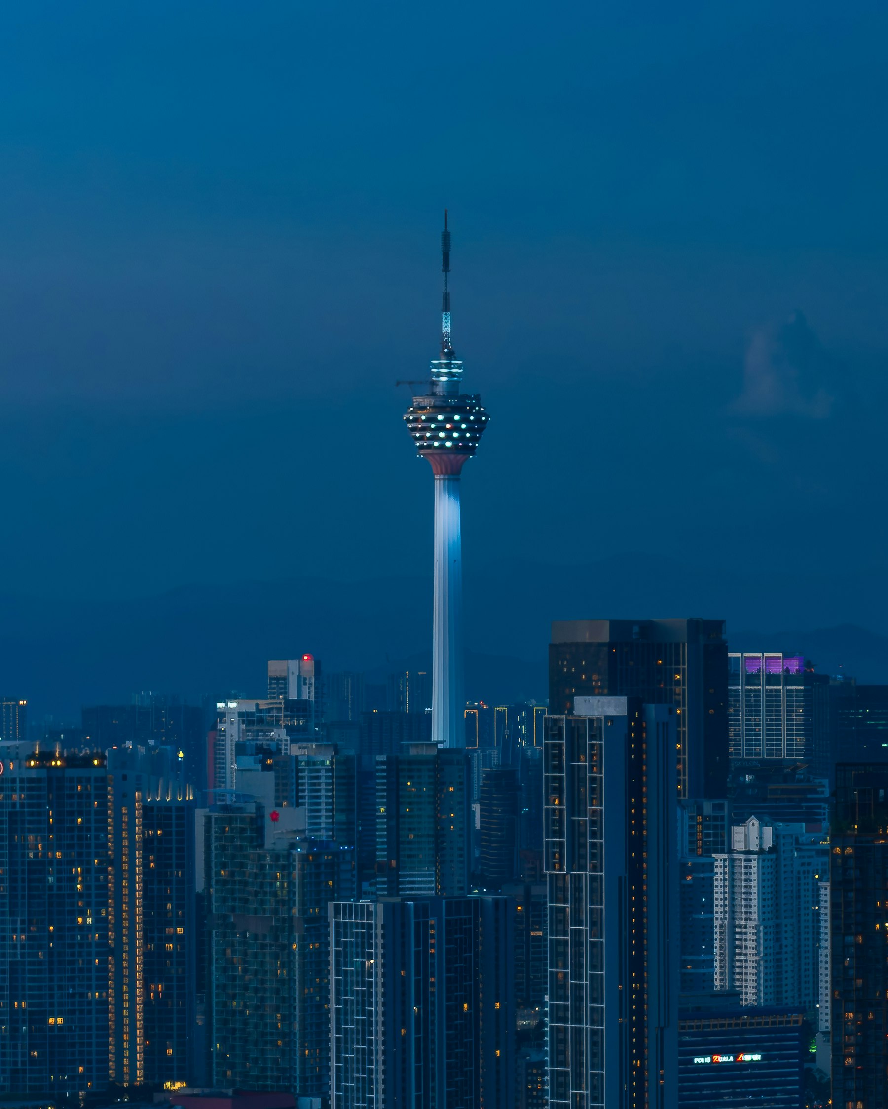 Modern Southeast Asian city skyline at dusk