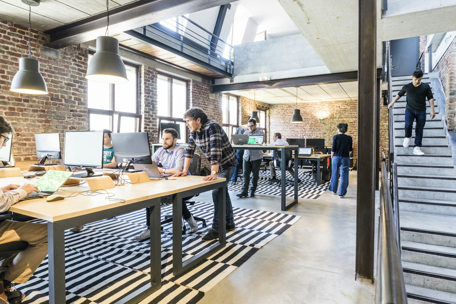 Colleagues working together in a modern office